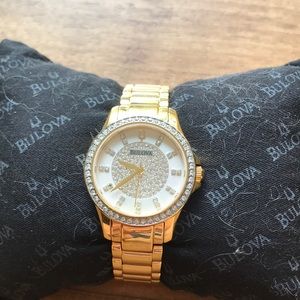 Bulova gold tone & quartz crystals watch
